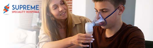 Doctor offering a Asthma Guy with nebulizer